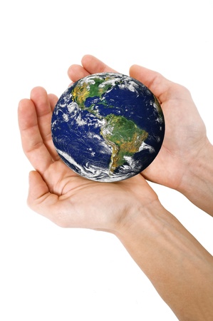 Human hands holding planet Earthの写真素材