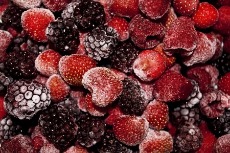 Fresh frozen strawberries and raspberries の写真素材