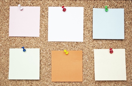 Blank memo notes on cork boardの写真素材