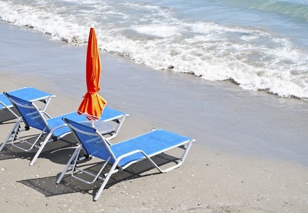 Sunbeds on beachの写真素材