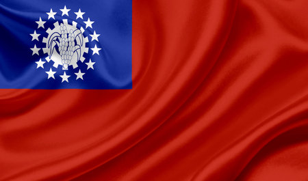 Myanmar waving flagの写真素材