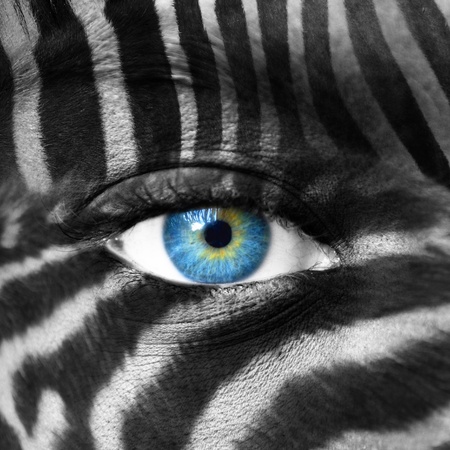 Human face with Zebra pattern - Save endangered species concept の写真素材