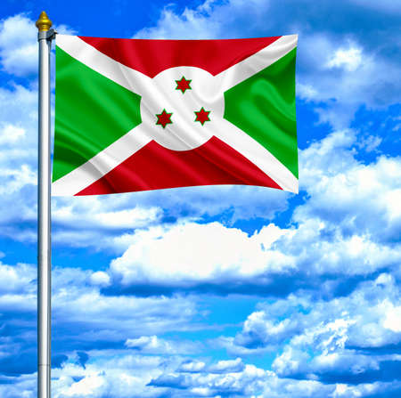 Burundi waving flag against blue skyの写真素材