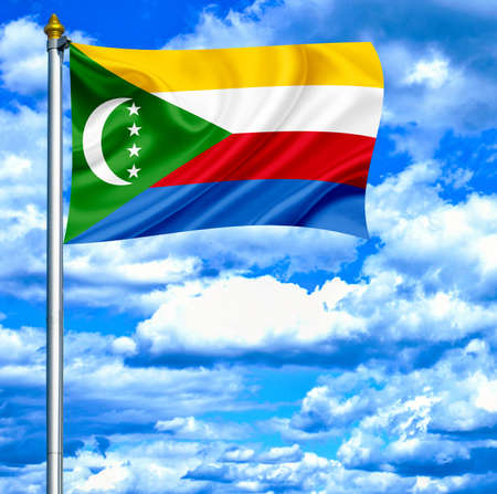 Comoros waving flag against blue skyの写真素材