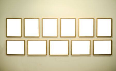 Empty picture frames on gallery wallの写真素材