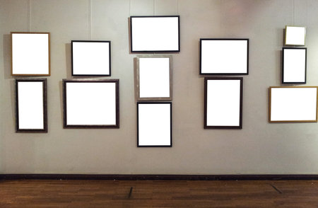 Blank photo frames on gallery wallの写真素材