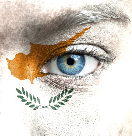 Human face painted with flag of Cyprusの写真素材