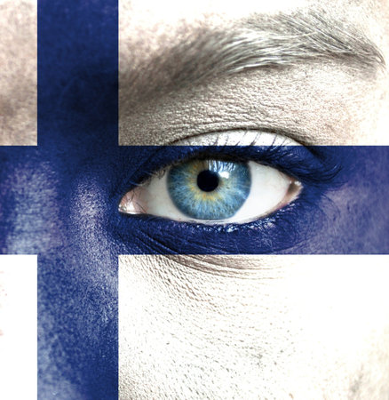 Human face painted with flag of Finlandの写真素材