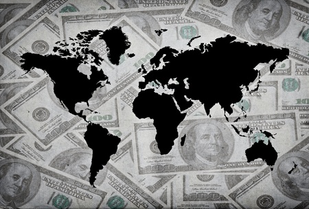 World map with dollard in backgroundの写真素材