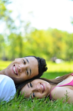 Happy young couple enjoying natureの写真素材
