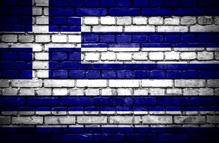 Brick wall with painted flag of Greeceの写真素材