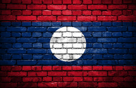 Brick wall with painted flag of Laosの写真素材