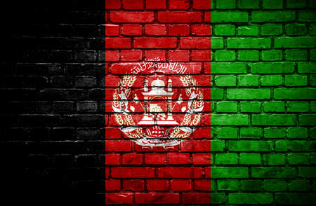 Brick wall with painted flag of Afghanistanの写真素材