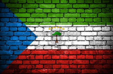 Brick wall with painted flag of Equatorial Guineaの写真素材