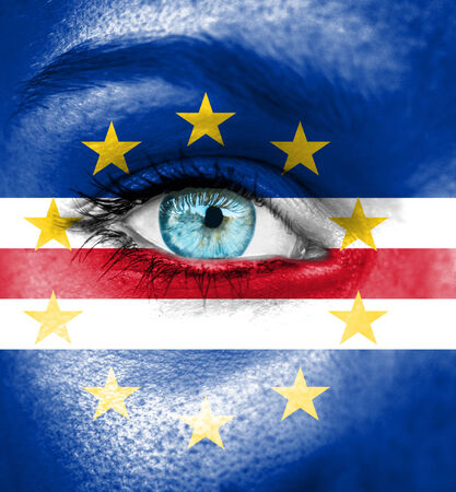 Woman face painted with flag of Cape Verdeの写真素材