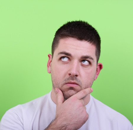 Portrait of thoughtful man looking upの写真素材