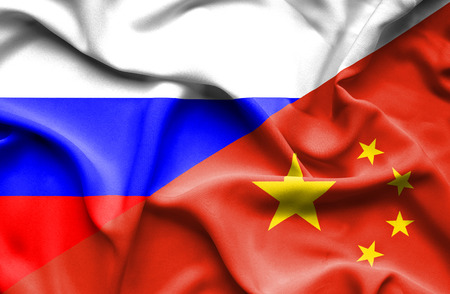 Waving flag of China and Russiaの写真素材