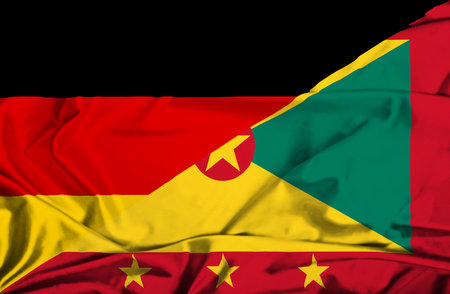 Waving flag of Guernsey and Germanyの写真素材