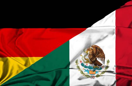 Waving flag of Mexico and Germanyの写真素材