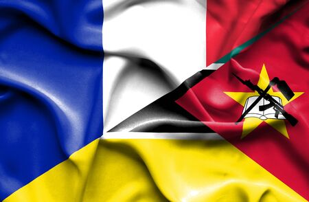 Waving flag of Mozambique and Franceの写真素材