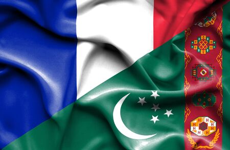 Waving flag of Turkmenistan and Franceの写真素材