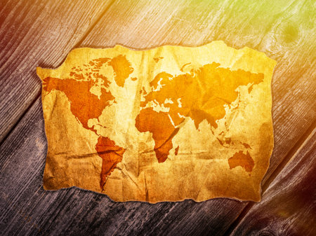 Old world map over wooden background