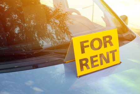 "RENT A CAR" sign on car - Rent a car conceptの写真素材