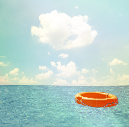 Help concept - Life buoy at open seaの写真素材