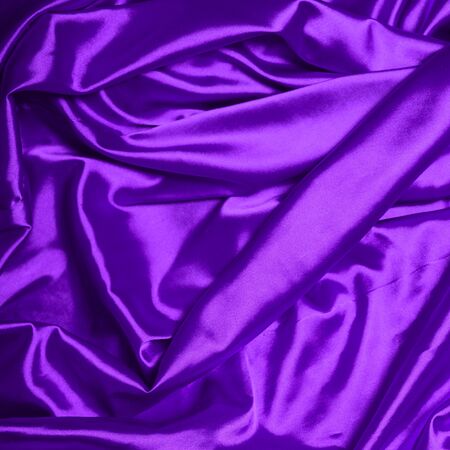 Smooth elegant purple silk backgroundの写真素材