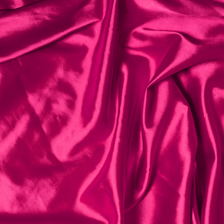Smooth elegant pink silk backgroundの写真素材