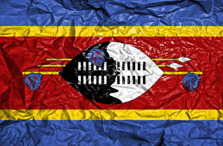 Swaziland vintage flag on old crumpled paper backgroundの写真素材