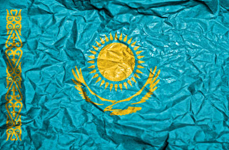 Kazakhstan vintage flag on old crumpled paper backgroundの写真素材