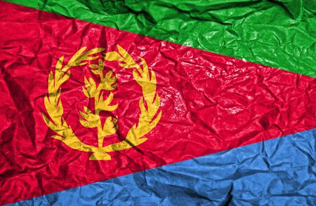 Eritrea vintage flag on old crumpled paper backgroundの写真素材