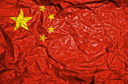 China vintage flag on old crumpled paper backgroundの写真素材