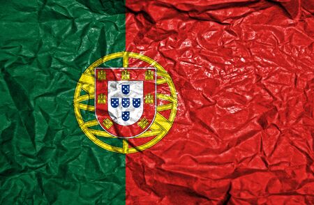 Portugal vintage flag on old crumpled paper backgroundの写真素材