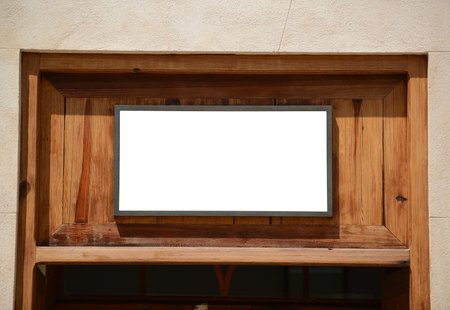 Blank board above wooden doorの写真素材