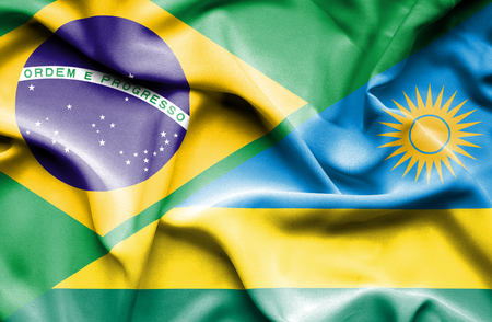 Waving flag of Rwanda andの写真素材