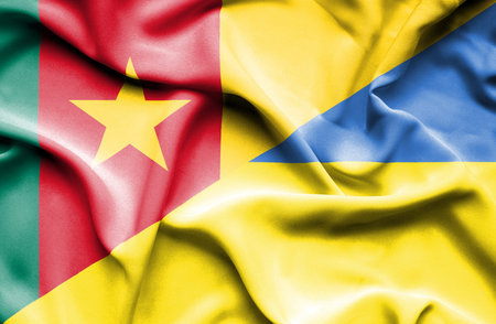 Waving flag of Ukraine and Cameroon