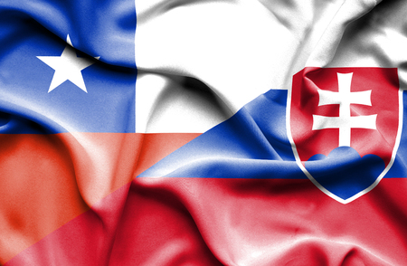 Waving flag of Slovakia and Chileの写真素材