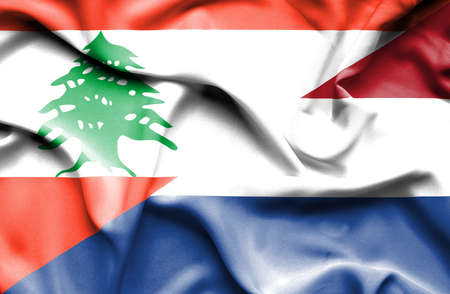 Waving flag of Netherlands and  Lebanonの写真素材