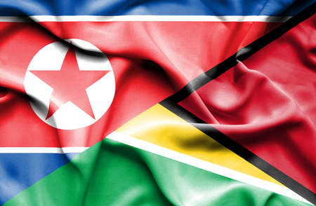 Waving flag of Guyana and North Koreaの写真素材