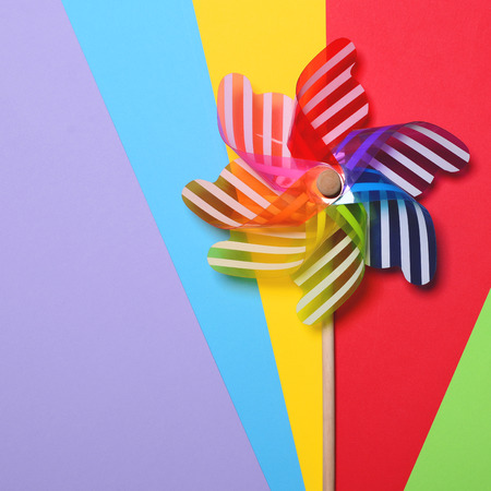 Multicolored pinwheel on colorul backgrounds - Minimal designの写真素材