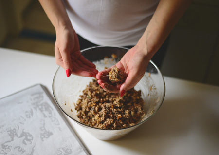 Woman hands making healthy biscuits  - Home made holliday cookies preparation setの写真素材