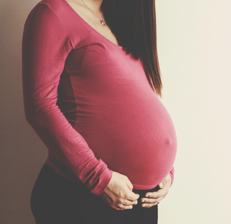 Pregnant beautiful woman portraitの写真素材