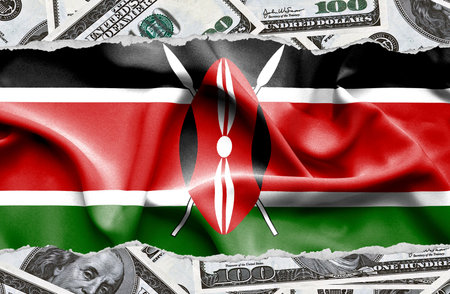 Financial concept with banknotes of US currency around national flag of Kenyaの写真素材