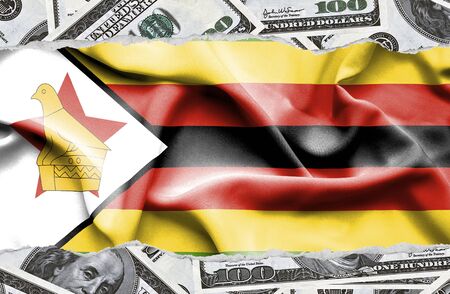 Financial concept with banknotes of US currency around national flag of Zimbabweの写真素材