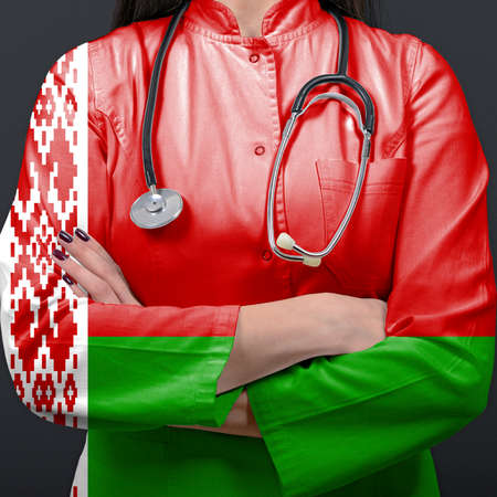 Doctor representing healthcare system with National flag of Belarusの写真素材