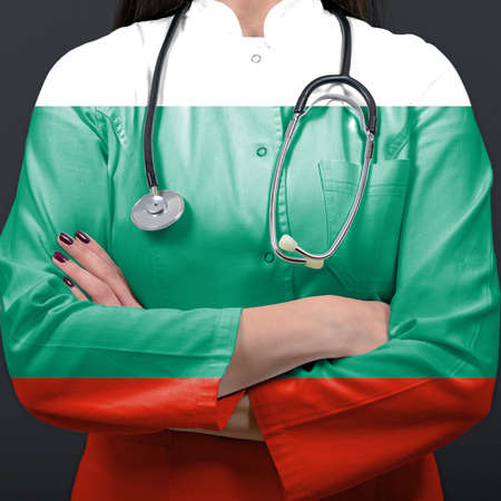 Doctor representing healthcare system with National flag of Bulgariaの写真素材