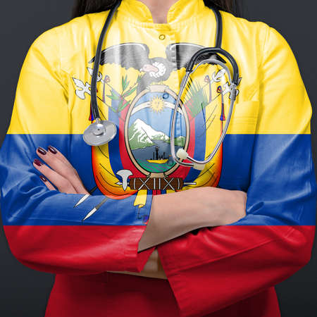 Doctor representing healthcare system with National flag of Ecuadorの写真素材
