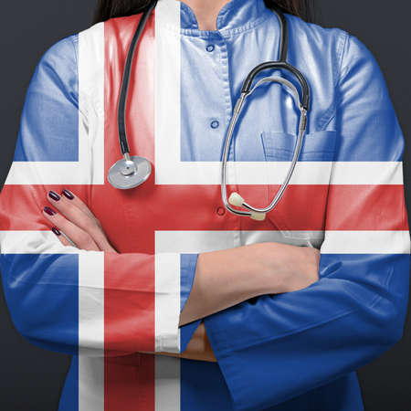 Doctor representing healthcare system with National flag of Icelandの写真素材